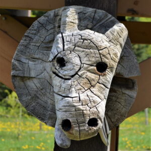 Wood carving of cow's head